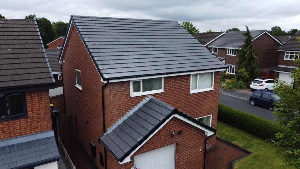 Slate roofers at work in Wilmslow for Regancy Roofing